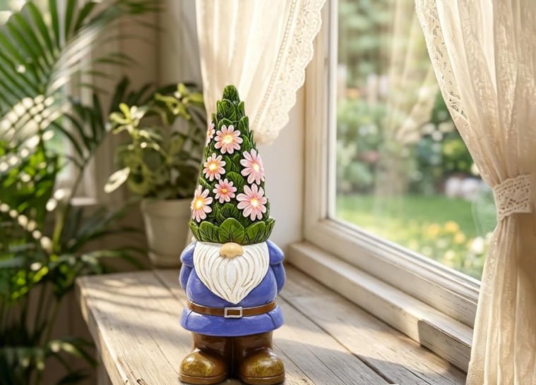Floral garden gnome on a cozy windowsill A decorative garden gnome with a green floral hat, blue shirt, and brown boots standing on a sunny wooden windowsill