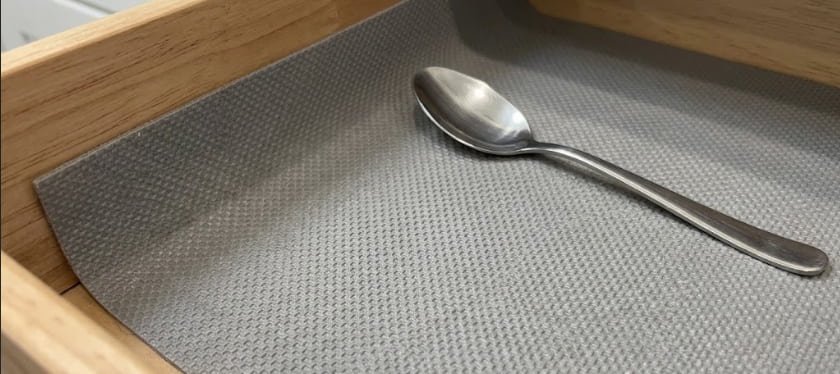 Close up of thick cabinet liner for kitchen with non slip grip texture